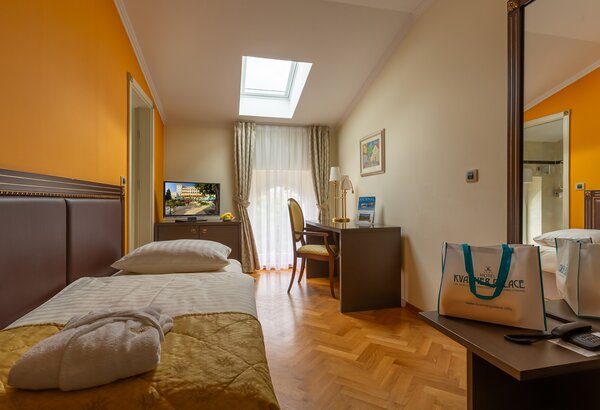 Single room in the attic at Kvarner Palace Single room at the historic hotel in Crikvenica