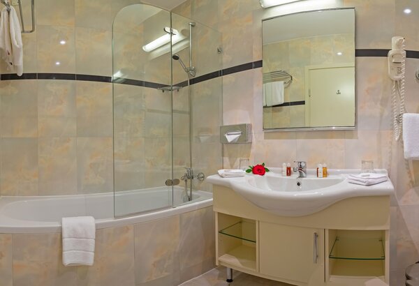 Hotel bathroom with bathtub at Kvarner Palace Double room with sea view at the beach hotel, Crikvenica